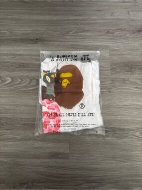 Bape White Tee with Brown & Yellow Ape Head and Pink Camo Accents